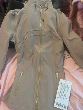 Women’s beige / gold define jacket discontinued